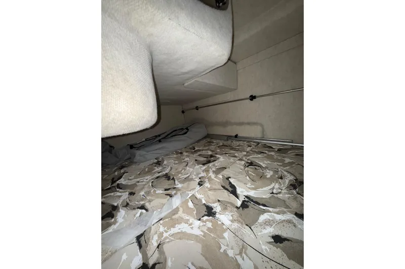 Slide: The Image of Two Interstate deep cycle marine batteries in a 2000 Sea Ray 240 Sundancer boat. - 8