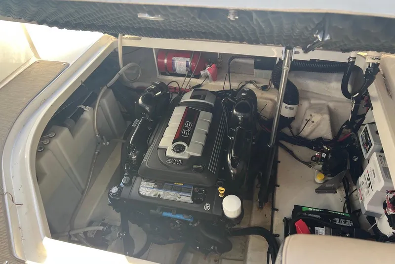 Slide: The Image of Engine compartment of a 2018 Sea Ray Sundancer 280 boat, featuring a 6.2L engine. - 29