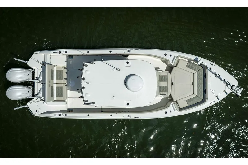 Slide: The Image of Manufacturer Provided Image: Aerial view of 2026 Solace 28 HCS boat with dual engines on water. - 13