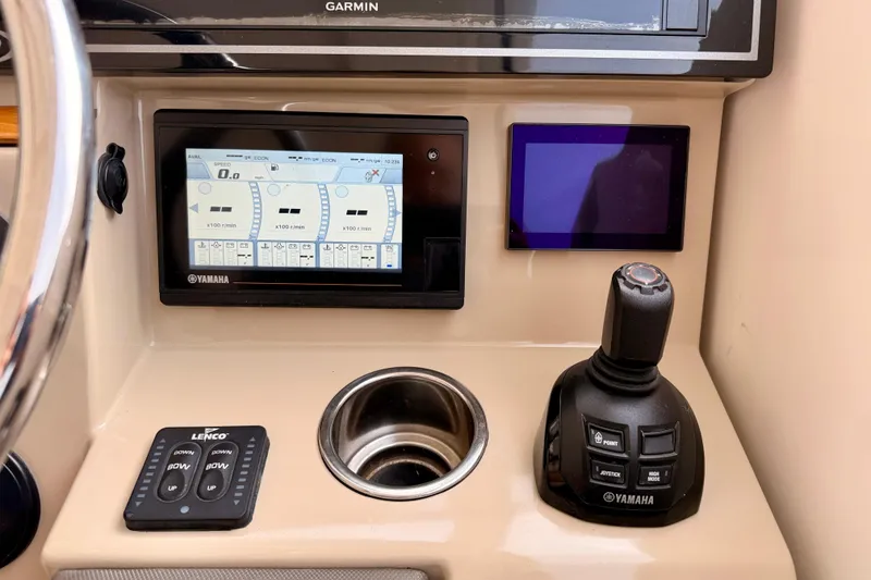Slide: The Image of Control panel of 2018 Pursuit DC 365 Dual Console with Yamaha display and joystick. - 18