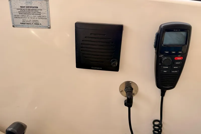 Slide: The Image of Control panel of 2018 Pursuit DC 365 Dual Console with Garmin and communication device. - 21