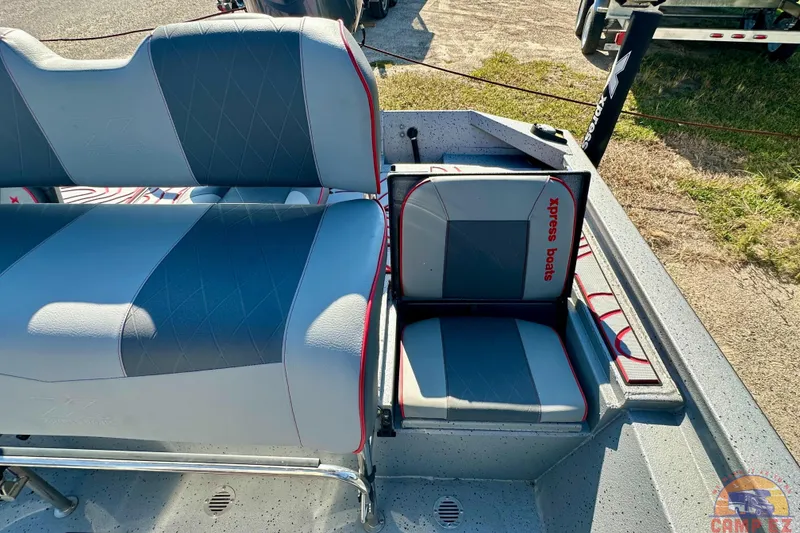 Slide: The Image of 2024 Express SW20B BAY boat seats with gray and red design, featuring "Xpress Boats" branding. - 10