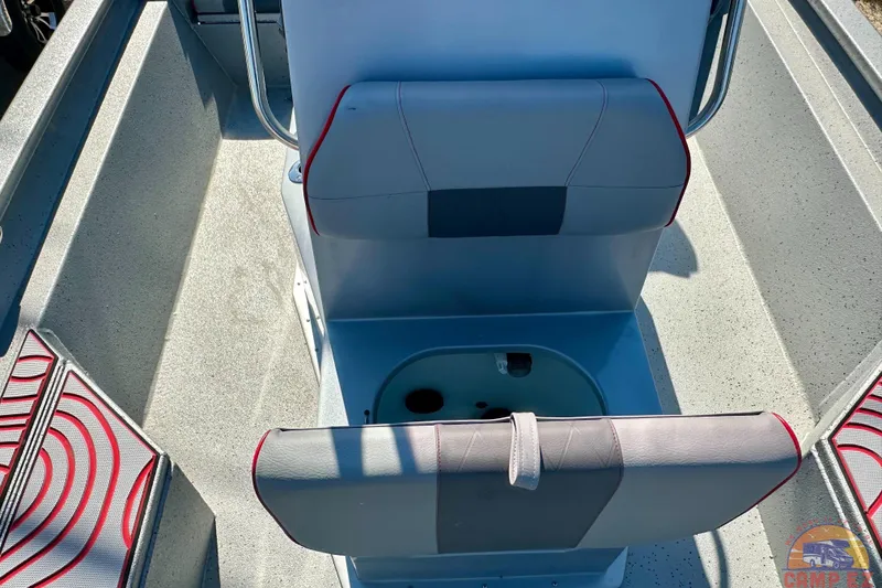 Slide: The Image of 2024 Express SW20B BAY boat interior with seating and storage compartments. - 24