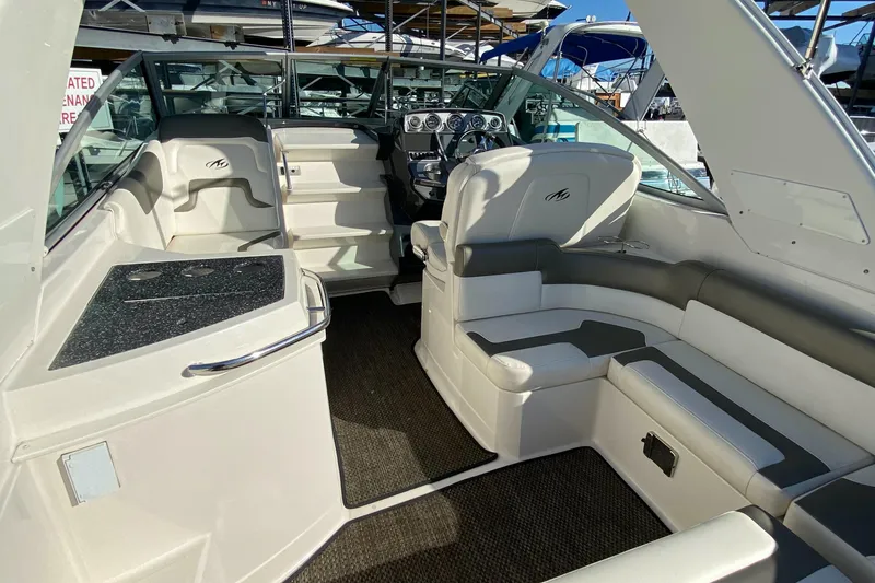 Slide: The Image of Interior of a 2014 Monterey 260 SCR boat, luxurious and spacious. - 13