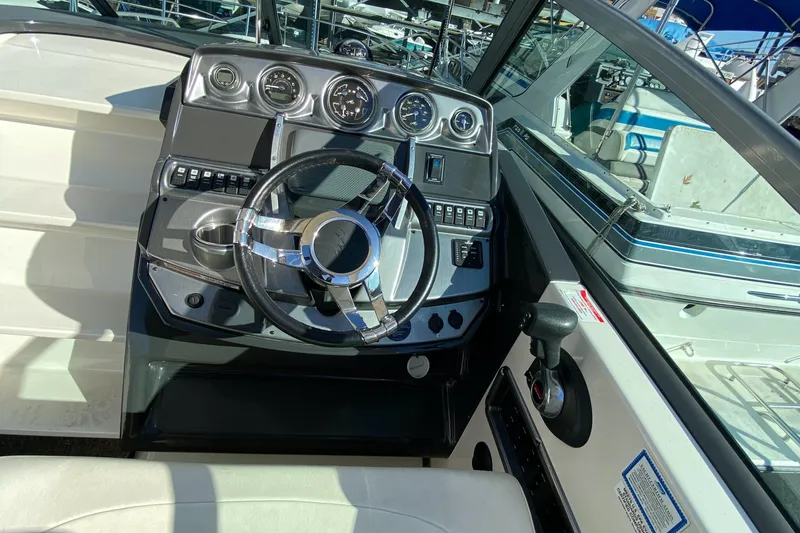 Slide: The Image of Cockpit of a 2014 Monterey 260 SCR boat. - 17
