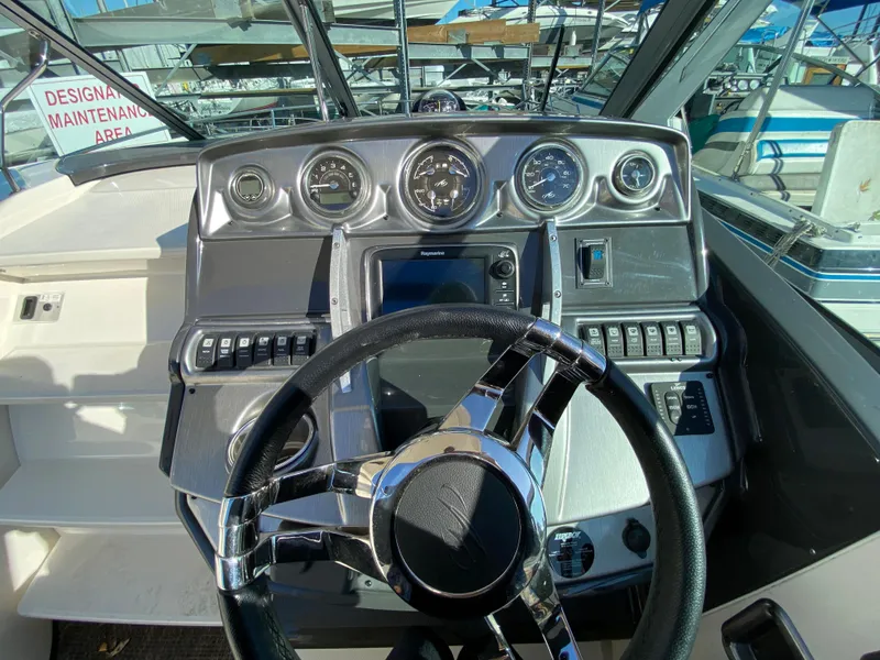 Slide: The Image of Dashboard of a 2014 Monterey 260 SCR boat. - 5