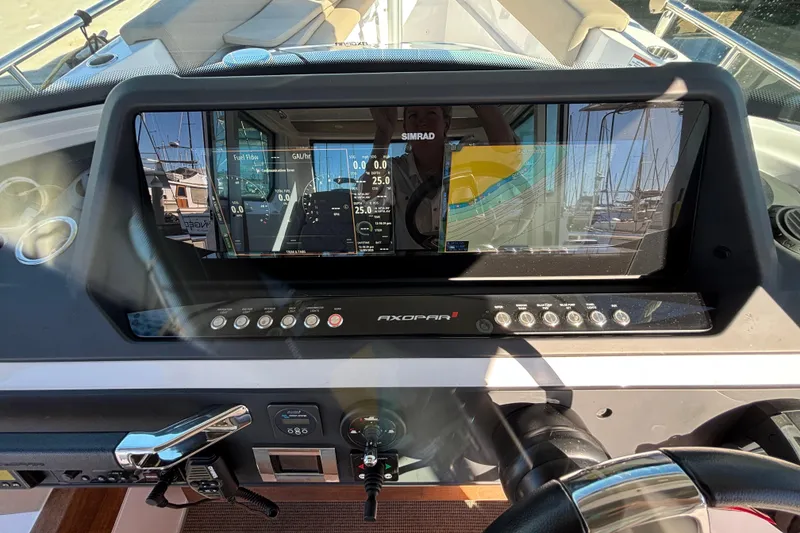 Slide: The Image of Dashboard of 2022 Axopar 28 AFT CABIN boat with navigation display. - 20