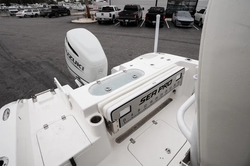 Slide: The Image of 2026 Sea Pro 222 Center Console boat with Suzuki engine in parking lot. - 16