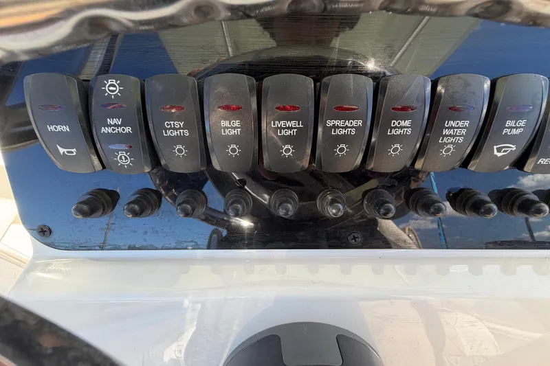 Slide: The Image of 2025 Bulls Bay 255 Center Console boat deck with storage hatch. - 29