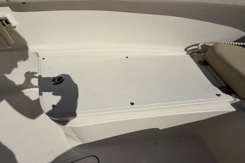Slide: The Image of 2025 Bulls Bay 255 Center Console boat seat with quilted beige upholstery. - 53