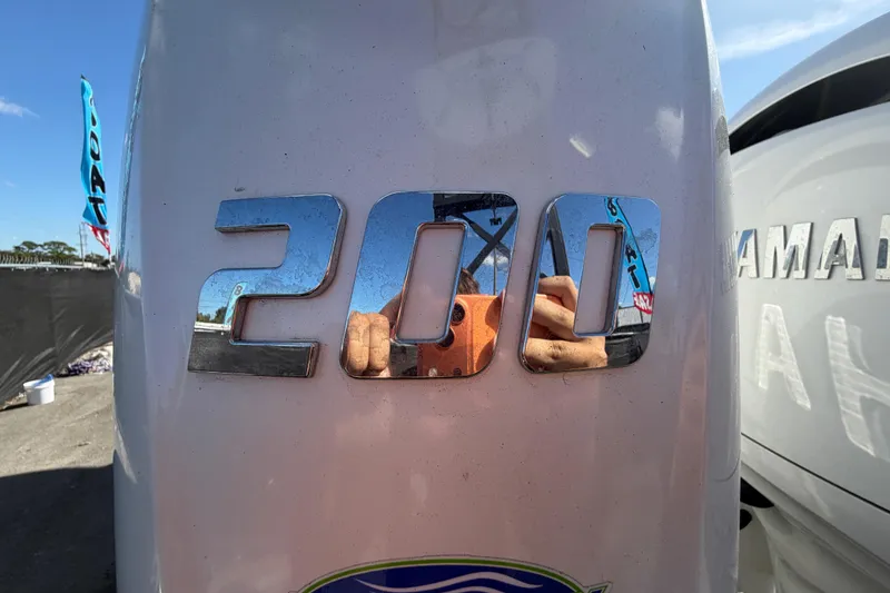 Slide: The Image of Close-up of 200 horsepower engine on 2025 Bulls Bay 255 Center Console boat. - 7
