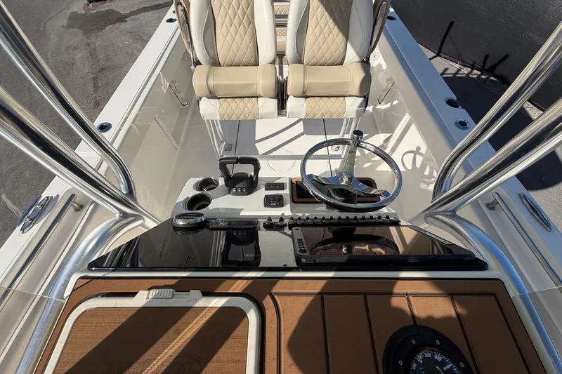 Slide: The Image of Open Engel cooler with wire basket inside, on Bulls Bay 255 Center Console, 2025 model. - 70
