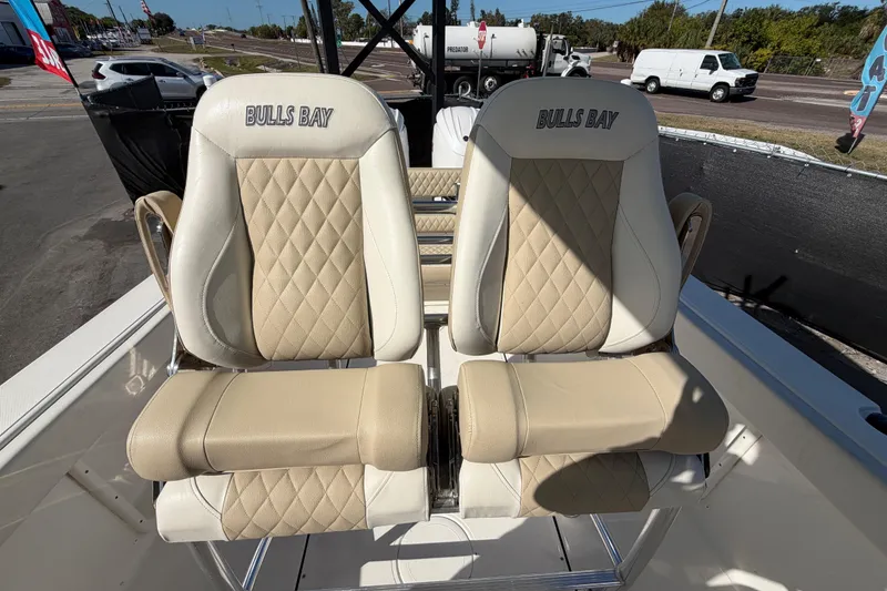 Slide: The Image of 2025 Bulls Bay 255 Center Console boat seats with diamond stitching design. - 75