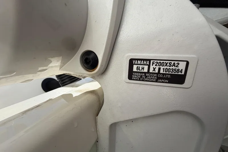 Slide: The Image of 2025 Bulls Bay 255 Center Console trailer label with specifications and VIN details. - 86