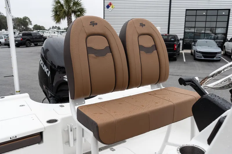 Slide: The Image of 2026 Sea Pro 210 Bay trailer wheels on gravel surface. - 10