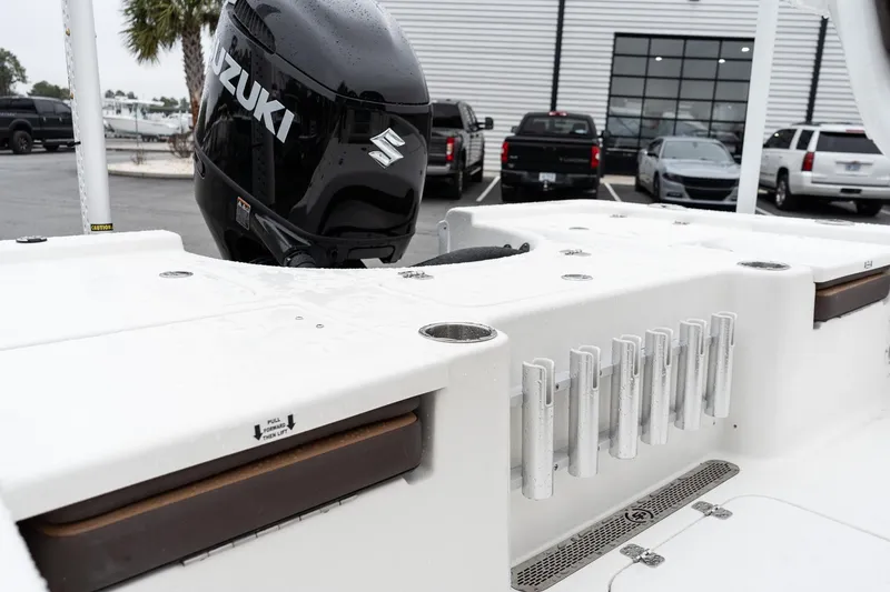 Slide: The Image of 2026 Sea Pro 210 Bay boat console with compass and Simrad electronics. - 11