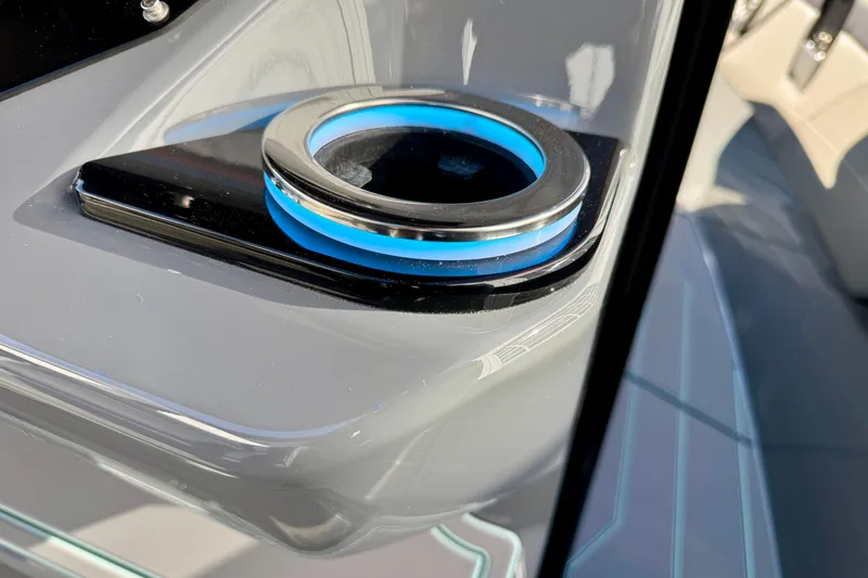 Slide: The Image of 2026 Sunsation 32 CCX boat cup holder with blue LED lighting. - 17