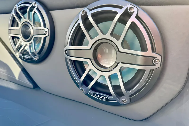 Slide: The Image of JL Audio speakers on 2026 Sunsation 32 CCX boat interior. - 18