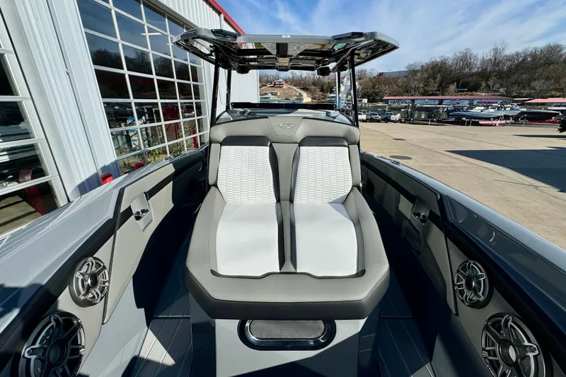 Slide: The Image of 2026 Sunsation 32 CCX boat interior with modern seating and sleek design. - 19