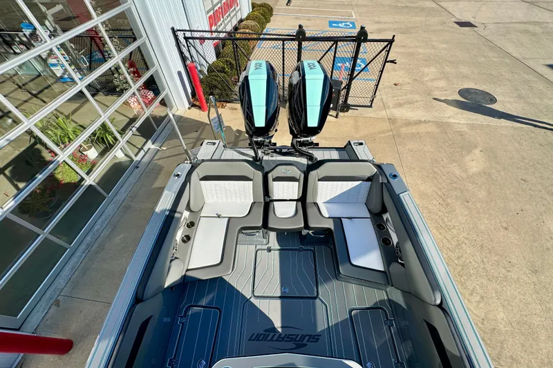 Slide: The Image of 2026 Sunsation 32 CCX boat interior with dual engines, sleek seating, and modern design. - 22