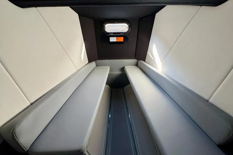 Slide: The Image of Interior cabin of 2026 Sunsation 32 CCX boat with sleek seating and window. - 28