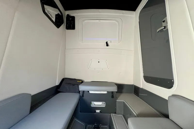 Slide: The Image of Interior cabin of 2026 Sunsation 32 CCX boat, featuring seating and storage. - 29