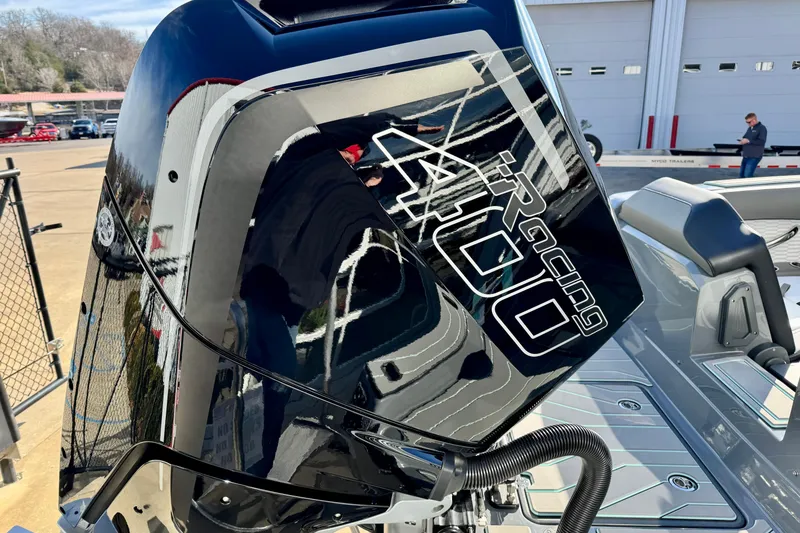 Slide: The Image of 2026 Sunsation 32 CCX with powerful Racing 400 engine, showcased outdoors. - 8