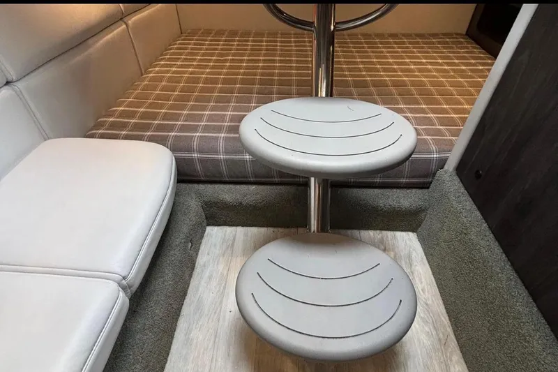 Slide: The Image of 2022 Formula 350 Crossover Bowrider OB interior with seating and steps. - 20