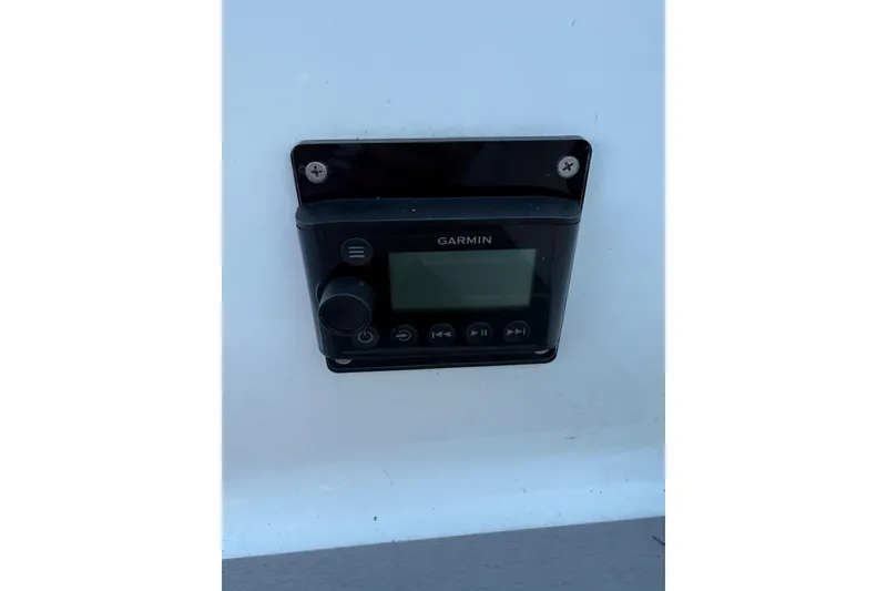 Slide: The Image of Garmin device on 2022 Formula 350 Crossover Bowrider OB boat dashboard. - 24