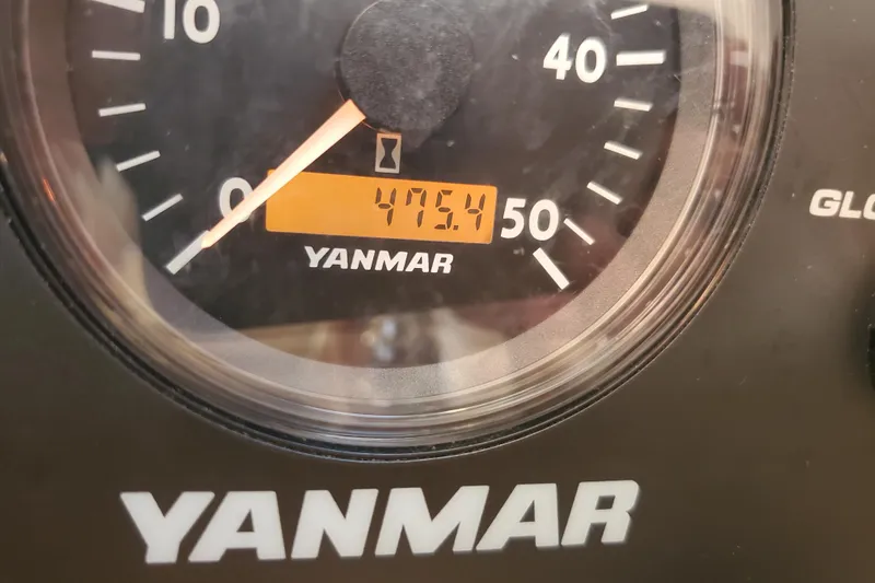 Slide: The Image of Close-up of Yanmar gauge showing 475.4 hours on a 2008 Ranger Tugs R-25. - 18