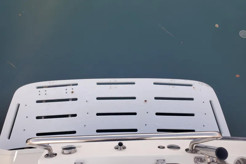 Slide: The Image of Swim platform of 2008 Ranger Tugs R-25 boat on calm water. - 25