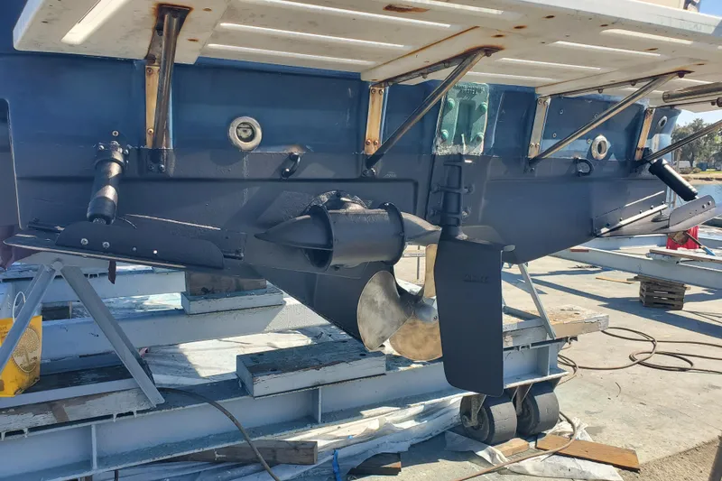 Slide: The Image of 2008 Ranger Tugs R-25 boat stern view with propeller and rudder on dry dock. - 33