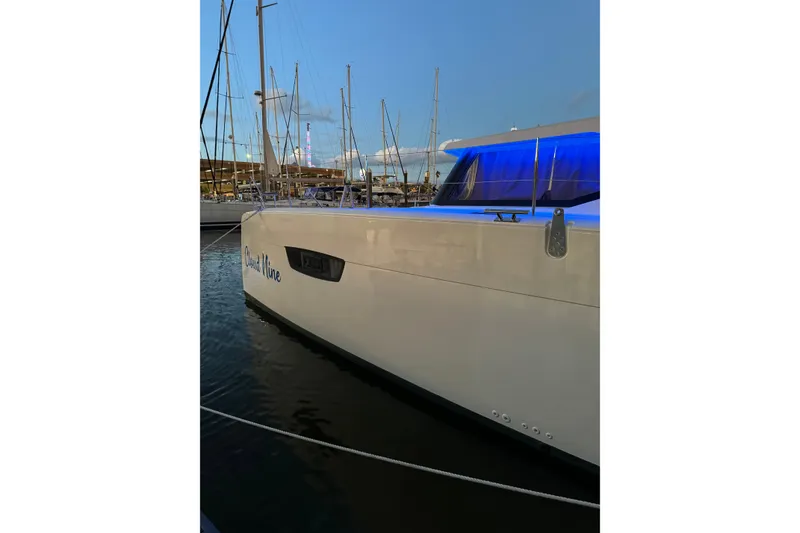 Slide: The Image of 2020 Fountaine Pajot Astrea 42 Catamaran docked at marina during sunset. - 16