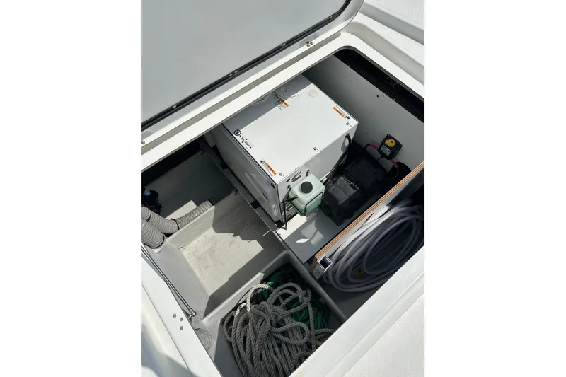 Slide: The Image of Storage compartment of 2020 Fountaine Pajot Astrea 42 Catamaran with equipment and ropes. - 18