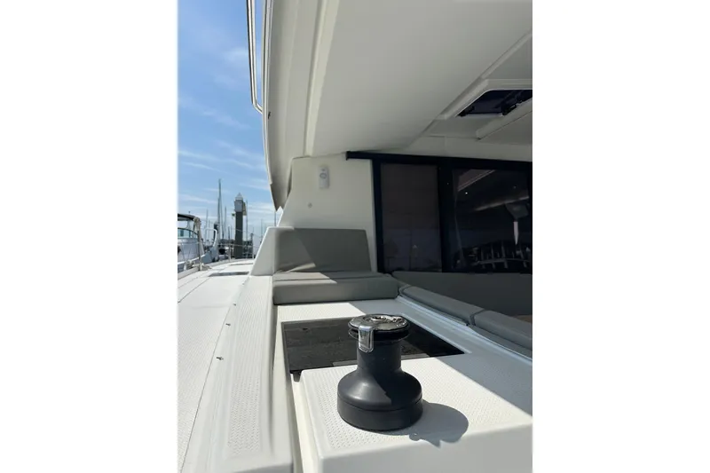 Slide: The Image of 2020 Fountaine Pajot Astrea 42 Catamaran deck with seating and winch. - 31