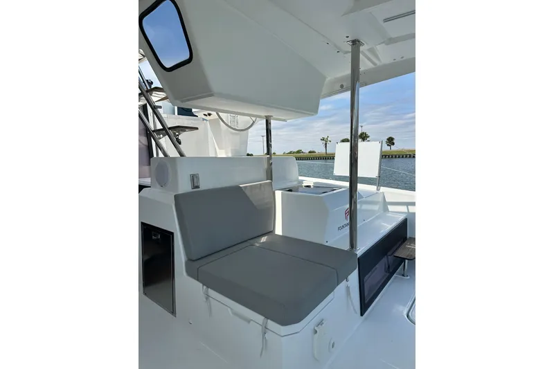 Slide: The Image of 2020 Fountaine Pajot Astrea 42 Catamaran seating area with ocean view. - 33