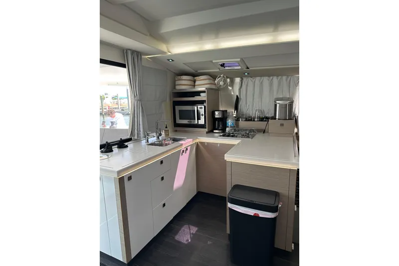 Slide: The Image of Modern kitchen interior of 2020 Fountaine Pajot Astrea 42 Catamaran with appliances and sleek design. - 37