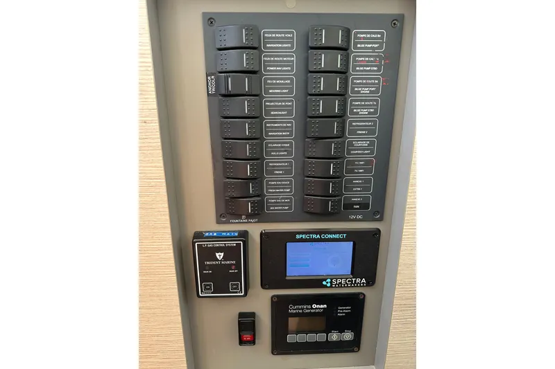 Slide: The Image of Control panel of a 2020 Fountaine Pajot Astrea 42 Catamaran with switches and displays. - 44