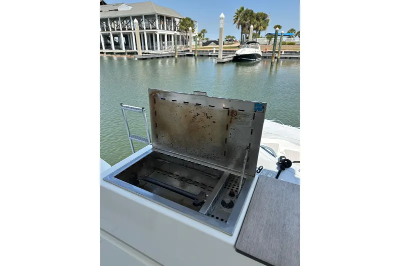 Slide: The Image of Outdoor grill on 2020 Fountaine Pajot Astrea 42 Catamaran, docked by waterfront. - 45
