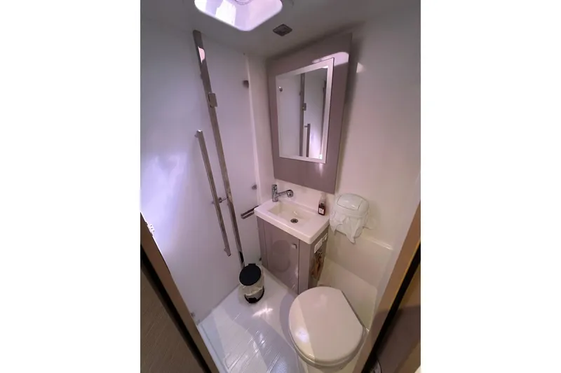 Slide: The Image of Modern bathroom in 2020 Fountaine Pajot Astrea 42 Catamaran, featuring compact design and amenities. - 47