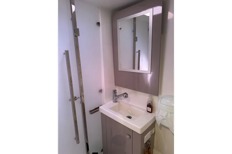 Slide: The Image of Modern bathroom in 2020 Fountaine Pajot Astrea 42 Catamaran with sink and mirror. - 48