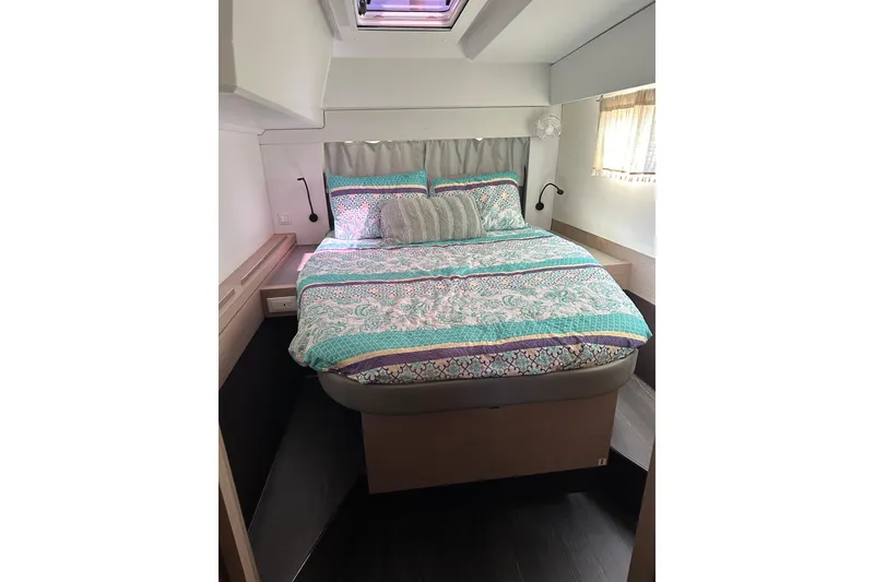 Slide: The Image of Cozy bedroom in 2020 Fountaine Pajot Astrea 42 Catamaran with colorful bedding. - 53