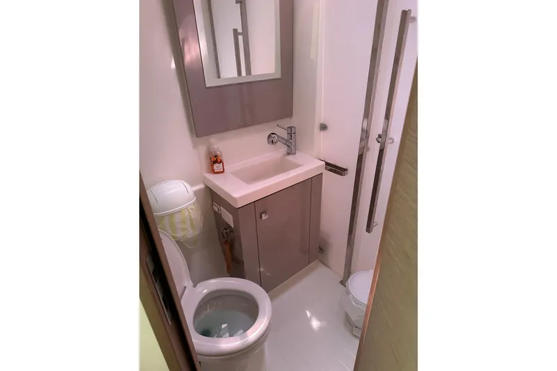 Slide: The Image of Bathroom interior of 2020 Fountaine Pajot Astrea 42 Catamaran, featuring modern fixtures. - 54