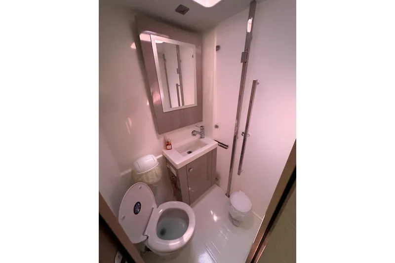 Slide: The Image of Bathroom interior of 2020 Fountaine Pajot Astrea 42 Catamaran, featuring modern fixtures and compact design. - 55