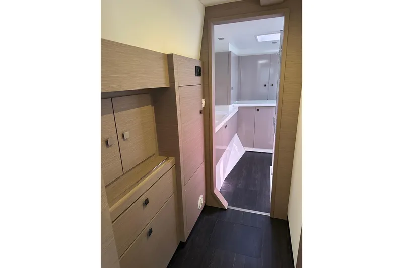 Slide: The Image of Interior of 2020 Fountaine Pajot Astrea 42 Catamaran with modern wood cabinetry. - 61