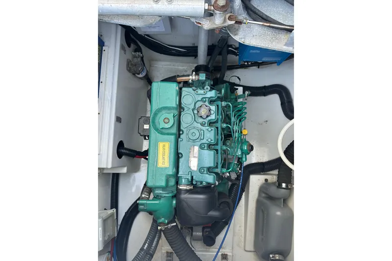 Slide: The Image of Engine compartment of a 2020 Fountaine Pajot Astrea 42 Catamaran, showcasing mechanical components. - 68