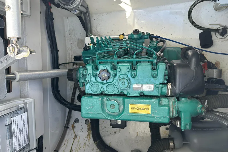 Slide: The Image of Engine compartment of a 2020 Fountaine Pajot Astrea 42 Catamaran, featuring a Volvo engine. - 74