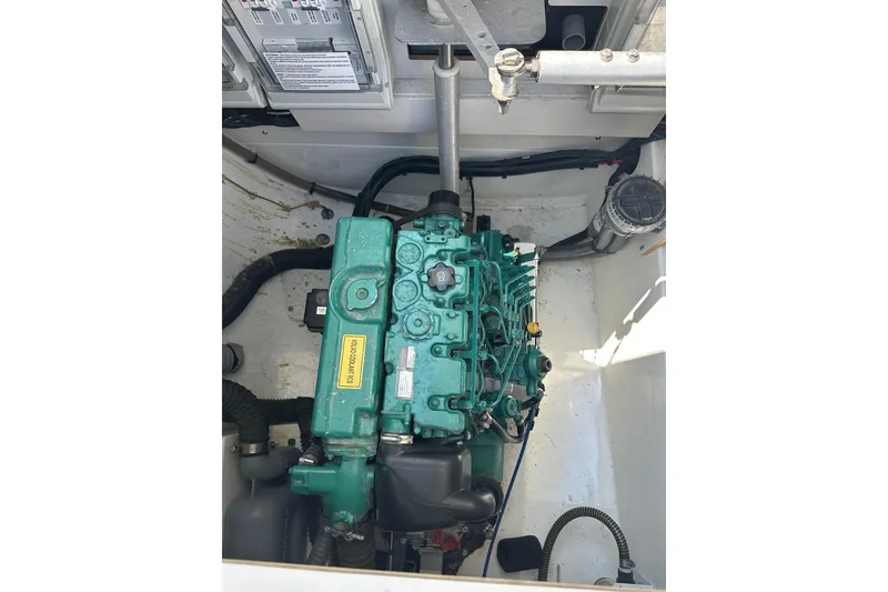 Slide: The Image of Engine compartment of a 2020 Fountaine Pajot Astrea 42 Catamaran, showcasing mechanical components. - 79