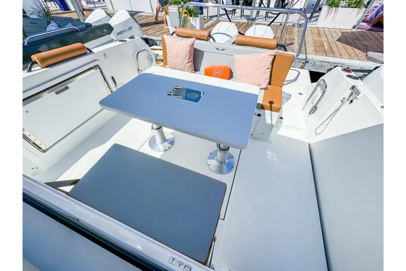 Slide: The Image of Interior of Beneteau Flyer 9 SPACEdeck 2026 with table and seating area. - 7