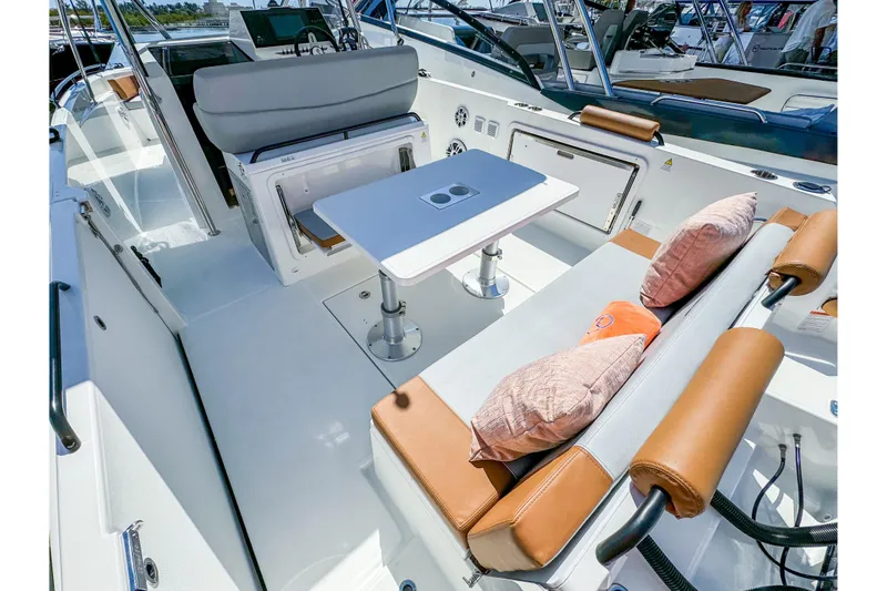 Slide: The Image of Interior of 2026 Beneteau Flyer 9 SPACEdeck with seating and table. - 8